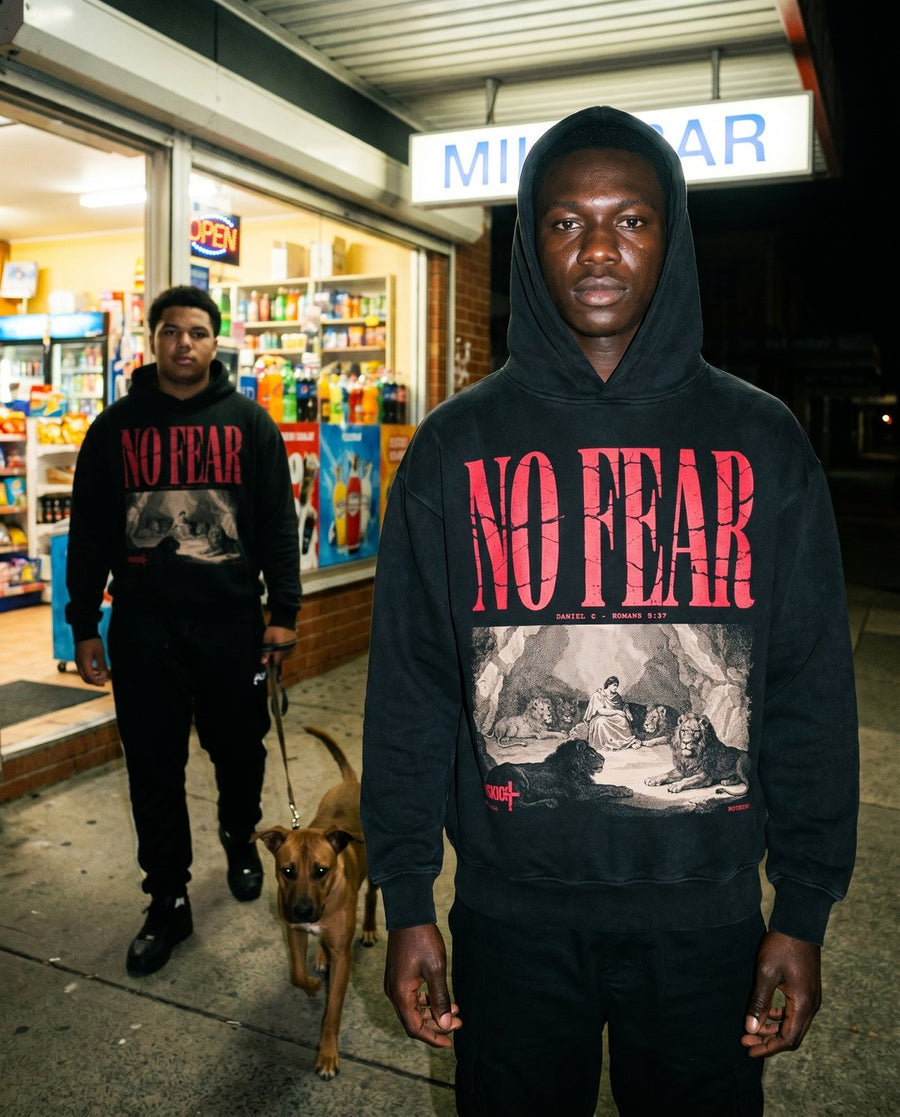 Model wearing NaskiCo No Fear tee